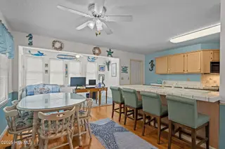 109 NE 1st Street, Oak Island, NC 28465 – photo 11: 29-web-or-mls-DSC03812