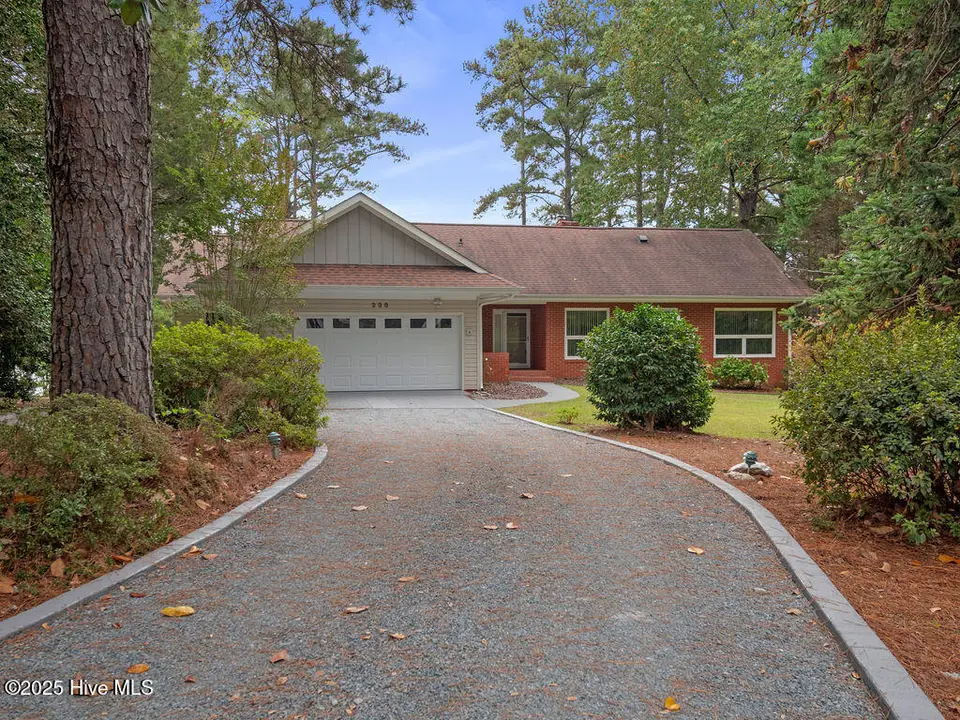 238 Pine Ridge Drive, Whispering Pines, NC 28327 – photo 1 of 48: FROM STREET
