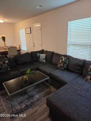 3302 Taylors Pointe Drive, Winterville, NC 28590 – photo 3: Open living room view 2