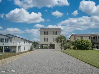 2518 W Pelican Drive, Oak Island, NC 28465 – photo 1: 2518 W Pelican Dr Oak Island NC 28465 US