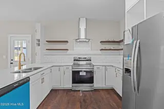 151 Creek Bend Drive, Vass, NC 28394 – photo 15: Kitchen w/Floating Shelves