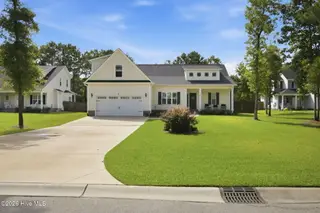 7189 Old Stump Drive SE, Leland, NC 28451 — 4-bedroom home in Cypress Bay, Leland, NC, photo 1 of 49