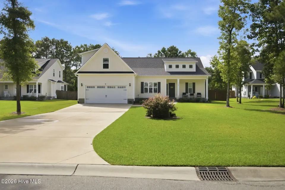 7189 Old Stump Drive SE, Leland, NC 28451 — 4-bedroom home in Cypress Bay, Leland, NC, photo 1 of 49