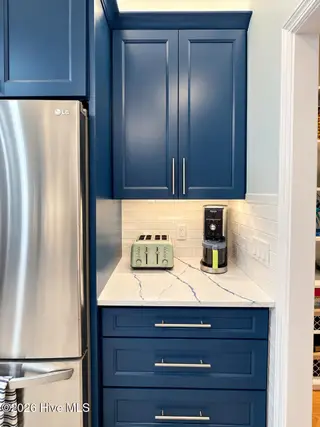 301 Wisteria Way, Caswell Beach, NC 28465 – photo 10: Kitchen nook