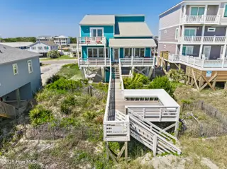 1123 E Beach Drive, Oak Island, NC 28465 – photo 7: mls-DJI_20250428105523_0116_D