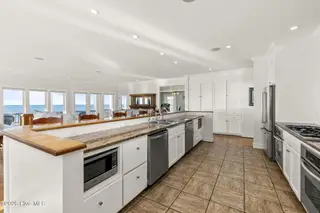 3107 Ocean Drive, Emerald Isle, NC 28594 – photo 5: Spacious kitchen w/ bar seating