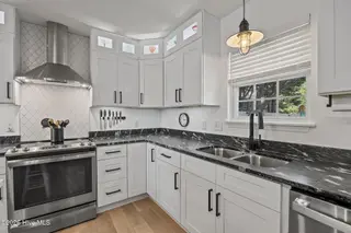 111 NW 10th Street, Oak Island, NC 28465 – photo 16: 27 kitchen