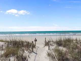 1717 W Beach Drive, Oak Island, NC 28465 – photo 7: 5-web-or-mls-DJI_20260416115825_0894_D