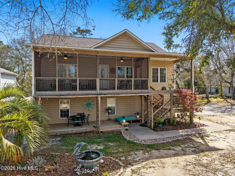 1401 E Oak Island Drive, Oak Island, NC 28465 – photo 1 of 53: Front View