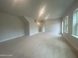 400 Sweet Potato Lane Lot 17, Nashville, NC 27856 – photo 13: loft and bedroom in basement