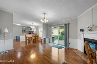 1109 Nautical Lane SW, Calabash, NC 28467 — 4-bedroom manufactured home in Village At Calabash, Calabash, NC, photo 15 of 34: Family room