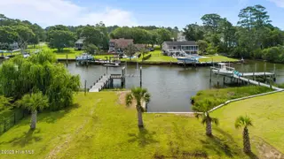 119 L 10 Cape Point Boulevard, Cape Carteret, NC 28584 – photo 11: 4 Established Palms in place.