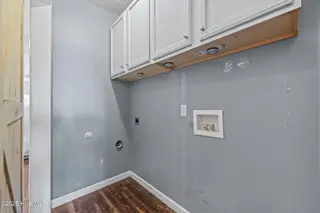 122 Tanbark Drive, Jacksonville, NC 28546 — 3-bedroom home in Aragona Village, Jacksonville, NC, photo 16 of 53: Laundry Closet