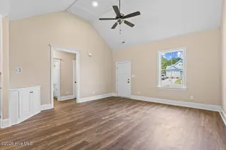 3809 Lightwater Lane, Elm City, NC 27822 – photo 10: Lightwater Living Room Vaulted Ceiling
