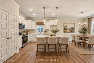 41 Tuskeegee Drive, Smithfield, NC 27577 – photo 18: Breakfast bar and kitchen