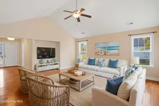 2021 Albemarle Road, Southport, NC 28461 – photo 5: living room white blue