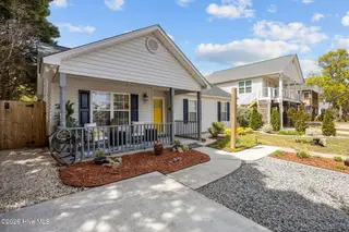 111 NW 10th Street, Oak Island, NC 28465 – photo 4: 8 front porch left