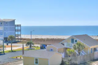 5207 E Pelican Drive, Oak Island, NC 28465 – photo 6: 5207 E Pelican Drive 5