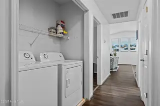 303 Osprey Ridge Drive South, Emerald Isle, NC 28594 – photo 13: Washer and Dryer Convey