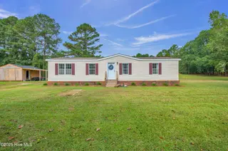 2216 Bell Williams Road, Burgaw, NC 28425 — 3-bedroom manufactured home, Burgaw, NC, photo 1 of 25: Welcome Home!