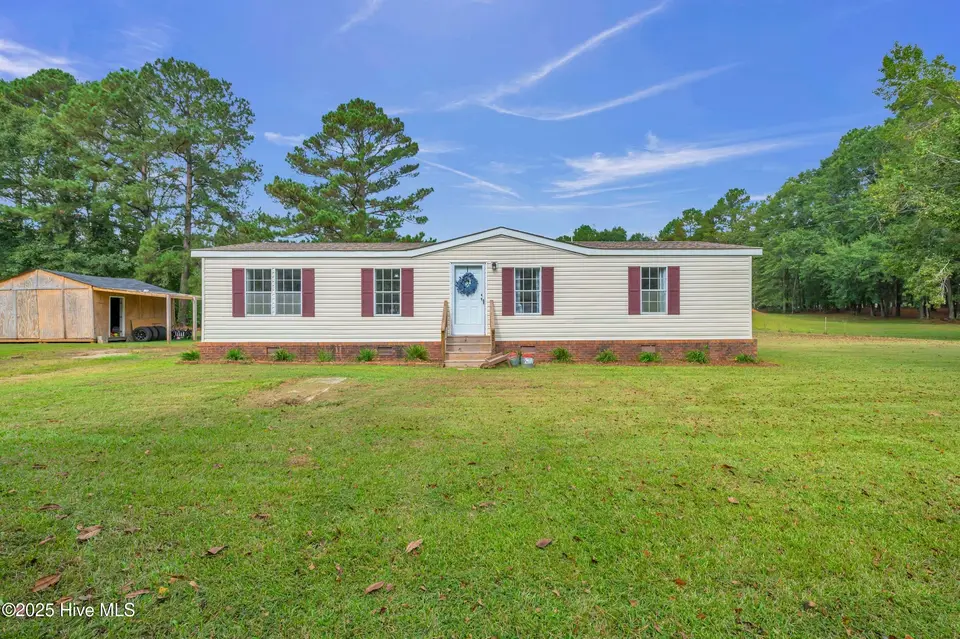 2216 Bell Williams Road, Burgaw, NC 28425 — 3-bedroom manufactured home, Burgaw, NC, photo 1 of 25: Welcome Home!