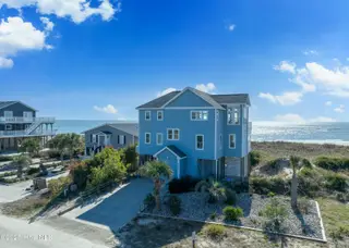 6901 W Beach Drive, Oak Island, NC 28465 – photo 1: 6901 W Beach Dr, OKI