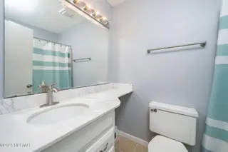 1405 Canal Drive Apt 17, Carolina Beach, NC 28428 – photo 19: 25-web-or-mls-1405 Canal Dr #17-23 copy