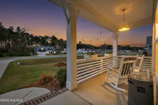 6923 Campbells Ridge Drive SE, Leland, NC 28451 – photo 5: 6923CampbellsRidgeDrSE_Porch_Dusk