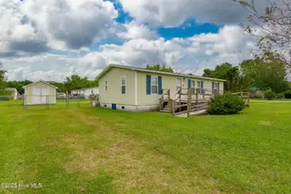 100 Lindsey Court, Beaufort, NC 28516 — 3-bedroom manufactured home in Green Meadows, Beaufort, NC, photo 2 of 38: Front of Home and Storage