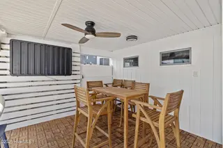 3617 W Pelican Drive, Oak Island, NC 28465 – photo 15: 18_covered patio