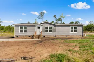 6830 Lewis Drive SE, Winnabow, NC 28479 – photo 1: 6830 Lewis Dr