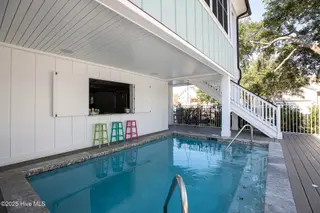 434 Settlers Lane, Kure Beach, NC 28449 – photo 4: Settlers434-poolDianaL33A7889 copy