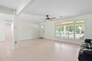 13290 New Britton Highway E, Nakina, NC 28455 – photo 16: Bright Well Lit Living Room