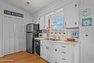 2906 E Dolphin Drive, Oak Island, NC 28465 – photo 15: 42-web-or-mls-DSC08887
