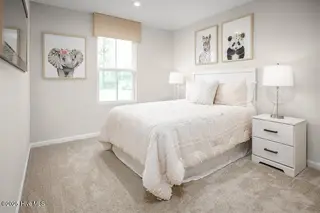 8131 Sterling Oaks Drive NW, Ash, NC 28420 – photo 6: Rosewood 2nd Guest BR