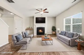 228 Monroe Fields Drive, Benson, NC 27504 – photo 8: 033_kv0a4026_-_living_room_-_modern_-_0_