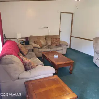107 Eagle Ridge Drive, Dudley, NC 28333 — 4-bedroom manufactured home in Eagle Ridge, Dudley, NC, photo 4 of 17: Living Room
