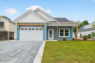 137 NE 3rd Street, Oak Island, NC 28465 – photo 1: Front of Home