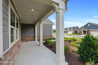 1064 Northbridge Court NW, Ocean Isle Beach, NC 28469 – photo 5: 1064 Northbridge Court NW Exterior 7