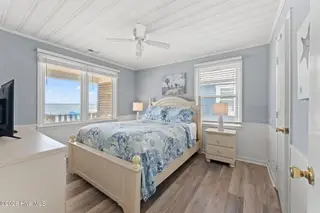 392 E First Street, Ocean Isle Beach, NC 28469 – photo 22: 1 of two oceanside primary bedrroms