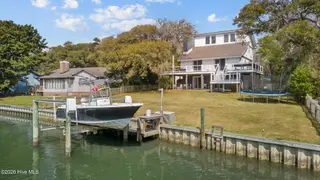 125 Loblolly Drive, Pine Knoll Shores, NC 28512 – photo 1: Dock and home