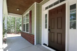 39 Forest Lake Drive, Jackson Springs, NC 27281 – photo 8: 8 Front Shady Rocking Chair Porch