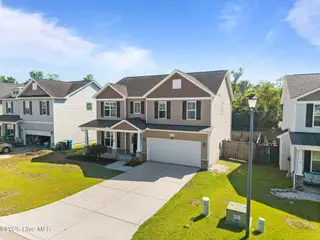 225 Peggys Trace, Sneads Ferry, NC 28460 – photo 4: 37-web-or-mls-DJI_20250513161157_0285_D