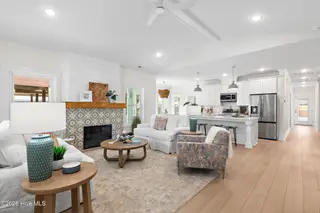 163 NW 4th Street, Oak Island, NC 28465 – photo 5: 4th Street Staged-1