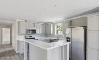 6801 Lewis Drive SE, Winnabow, NC 28479 – photo 19: Actual home