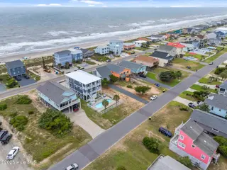 210 W Beach Drive, Oak Island, NC 28465 – photo 5: 5-web-or-mls-DJI_20250614135920_0270_D