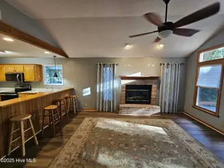 3235 Marsh View Drive SW, Supply, NC 28462 — 3-bedroom home in Lockwood Folly, Supply, NC, photo 9 of 36: Fireplace