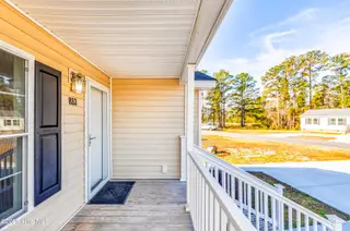 853 Yaupon Drive SW, Calabash, NC 28467 — 3-bedroom home in Clariday Estates, Calabash, NC, photo 20 of 22: Front View