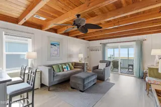 707 W Beach Drive, Oak Island, NC 28465 – photo 12: 03-Living Room