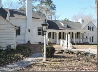 2856a Forest Hills Loop SW, Wilson, NC 27893 – photo 12: 12 _ Stone Path from Sun Porch